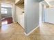 Open layout view featuring a washer and dryer in the laundry room and tile flooring at 8032 Astrology Ct # 201, Las Vegas, NV 89128
