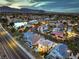This aerial view captures lakefront community and mountain backdrop at 8032 Marbella Cir, Las Vegas, NV 89128