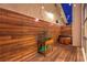 Private backyard with a jacuzzi, wood paneling, and ambient lighting to create an ideal outdoor relaxation space at 8032 Marbella Cir, Las Vegas, NV 89128