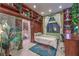 This bedroom features built-in shelving, a murphy bed, and whimsical decor at 8032 Marbella Cir, Las Vegas, NV 89128