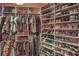 Walk-in closet with custom shelving and plenty of room for shoes, handbags and hanging storage at 8032 Marbella Cir, Las Vegas, NV 89128