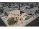 Aerial real estate image shows a home with solar panels, pool, water feature, and landscaping at 8102 Villa De La Playa St, Las Vegas, NV 89131