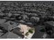 Aerial view of home showcasing solar panels, well manicured yard, and neighborhood at 8102 Villa De La Playa St, Las Vegas, NV 89131
