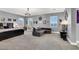Spacious main bedroom with plush carpet, sitting area, and ample natural light at 8102 Villa De La Playa St, Las Vegas, NV 89131