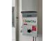 Close up of a modern Solar City inverter with digital display and safety cut-off at 8102 Villa De La Playa St, Las Vegas, NV 89131