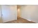 Bedroom featuring a large closet, neutral carpet and paint with an adjacent doorway at 8120 Finch Feather St, Las Vegas, NV 89143