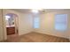 Spacious bedroom featuring a ceiling fan, neutral carpet, and an attached bathroom at 8120 Finch Feather St, Las Vegas, NV 89143