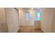 Upstairs hallway featuring carpet, white walls, closet and natural light at 8120 Finch Feather St, Las Vegas, NV 89143