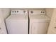 A dedicated laundry area showcasing a full-sized washer and dryer at 8120 Finch Feather St, Las Vegas, NV 89143
