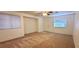 Living room featuring neutral paint, carpet flooring, ceiling fan, and natural light at 8120 Finch Feather St, Las Vegas, NV 89143