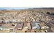 A neighborhood is shown from an aerial view at 827 Klamath Springs St, Henderson, NV 89011