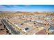 The aerial view showcases the surrounding community and mountains at 827 Klamath Springs St, Henderson, NV 89011