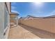View of the backyard with patio and gravel landscaping at 827 Klamath Springs St, Henderson, NV 89011