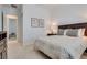 This bedroom features soft carpet, natural light, and neutral wall colors at 827 Klamath Springs St, Henderson, NV 89011