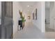 Bright entryway with white tile floors, modern decor, and an open view into the home at 827 Klamath Springs St, Henderson, NV 89011