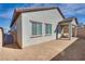 The backyard features a covered patio area and simple landscaping at 827 Klamath Springs St, Henderson, NV 89011
