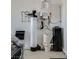 Garage corner featuring a water filtration system, offering a glimpse of home's maintenance setup at 827 Klamath Springs St, Henderson, NV 89011