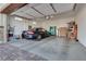 Spacious garage featuring a car parked inside, offering ample storage and parking at 827 Klamath Springs St, Henderson, NV 89011