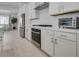 Well-lit kitchen with stainless steel appliances and white countertops at 827 Klamath Springs St, Henderson, NV 89011