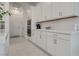 Kitchen area with white cabinets and stainless appliances at 827 Klamath Springs St, Henderson, NV 89011