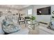 Spacious living room with contemporary decor, featuring a view of the kitchen and modern amenities at 827 Klamath Springs St, Henderson, NV 89011