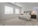 Spacious main bedroom boasts soft carpet, neutral tones, and natural light at 827 Klamath Springs St, Henderson, NV 89011