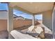 Covered brick patio featuring outdoor seating at 827 Klamath Springs St, Henderson, NV 89011