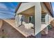 The covered patio features brick flooring and seating at 827 Klamath Springs St, Henderson, NV 89011