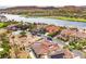 Stunning aerial view of luxury homes, lake, golf course, and mountains in a beautiful lakeside community at 9 Rue Grimaldi Way, Henderson, NV 89011