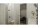 Modern bathroom with walk-in shower and a partial view into a bedroom at 9 Rue Grimaldi Way, Henderson, NV 89011