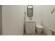 Modern powder room featuring a floating vanity with marble countertop and a sleek toilet at 9 Rue Grimaldi Way, Henderson, NV 89011