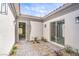 Private courtyard featuring desert landscaping, pavers, and access to interior spaces at 9 Rue Grimaldi Way, Henderson, NV 89011