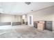 Open concept living room featuring neutral walls and recessed lighting, awaiting finishes at 9 Rue Grimaldi Way, Henderson, NV 89011