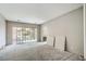 Spacious unfinished living room with sliding glass doors that lead to backyard at 9 Rue Grimaldi Way, Henderson, NV 89011