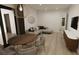 Bright living room with modern decor and a stylish dining area at 9 Rue Grimaldi Way, Henderson, NV 89011