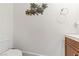 Cozy powder room featuring stylish turtle decor and a modern towel holder at 9050 W Tropicana Ave # 1102, Las Vegas, NV 89147
