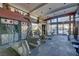 Community gym with exercise equipment, large windows, and natural light at 9050 W Tropicana Ave # 1102, Las Vegas, NV 89147
