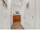 Bright hallway with modern wooden floors leading to a charming vanity at 9050 W Tropicana Ave # 1102, Las Vegas, NV 89147