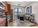 Modern kitchen with stainless steel appliances and large windows allowing natural light at 9050 W Tropicana Ave # 1102, Las Vegas, NV 89147