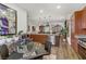 Well-lit kitchen with stainless steel appliances, a dining area, and access to living area at 9050 W Tropicana Ave # 1102, Las Vegas, NV 89147