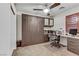 Functional home office with built-in desk and storage at 9050 W Tropicana Ave # 1102, Las Vegas, NV 89147