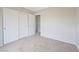 Neutral bedroom features carpet, a closet, and natural light at 9053 Pearl Cotton Ave, Las Vegas, NV 89149