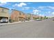 Charming two-story townhomes boast balconies and attached garages in a well-maintained community at 9053 Pearl Cotton Ave, Las Vegas, NV 89149