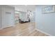 The living room features hardwood floors, recessed lighting, and a cozy seating area at 9053 Pearl Cotton Ave, Las Vegas, NV 89149