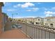 A view of townhomes from an upper level balcony in a residential community at 9053 Pearl Cotton Ave, Las Vegas, NV 89149