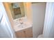 Bathroom vanity featuring a sink, mirror, and ample storage space at 9672 Gunsmith Dr, Las Vegas, NV 89123