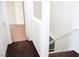 Top of the stairs landing featuring neutral carpet leading to other rooms in the home at 9672 Gunsmith Dr, Las Vegas, NV 89123