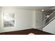 Open-concept room with large window, front door and stairway at 9672 Gunsmith Dr, Las Vegas, NV 89123