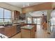 Bright and airy kitchen featuring an island, stainless steel appliances, and an open layout at 1093 Morning Sun Way, Las Vegas, NV 89110