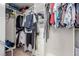 Walk-in closet features shelving and hanging storage, offering organized space for clothing and accessories at 11237 Gallery Echo St, Las Vegas, NV 89141